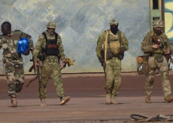 FILE - This undated photograph provided by the French military shows three Russian mercenaries, in northern Mali. Wagner is helping government forces in central and northern Mali carry out raids and drone strikes that have killed scores of civilians, including many children, rights groups said in reports published this week that span a period from December to March. (French Army via AP, File)