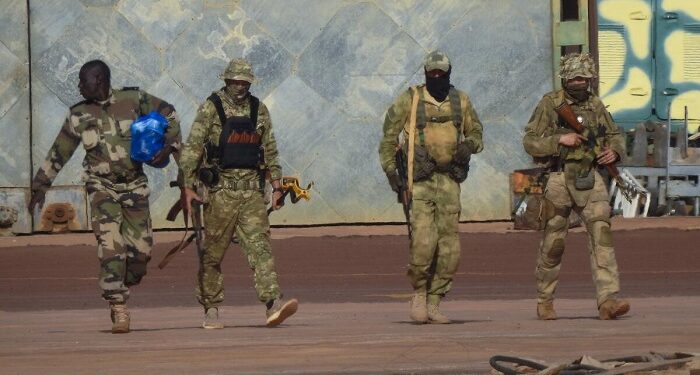 FILE - This undated photograph provided by the French military shows three Russian mercenaries, in northern Mali. Wagner is helping government forces in central and northern Mali carry out raids and drone strikes that have killed scores of civilians, including many children, rights groups said in reports published this week that span a period from December to March. (French Army via AP, File)