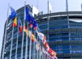 Flags waving in front of the European Parliament in Strasbourg