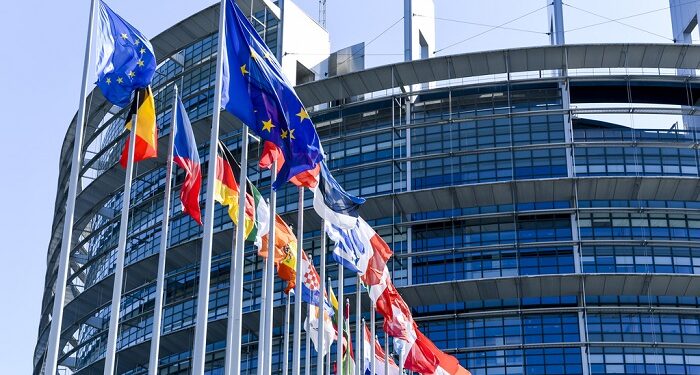 Flags waving in front of the European Parliament in Strasbourg