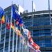 Flags waving in front of the European Parliament in Strasbourg