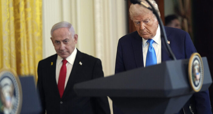 President Donald Trump and Israel's Prime Minister Benjamin Netanyahu arrive for a news conference in the East Room of the White House, Tuesday, Feb. 4, 2025, in Washington. (AP Photo/Evan Vucci)