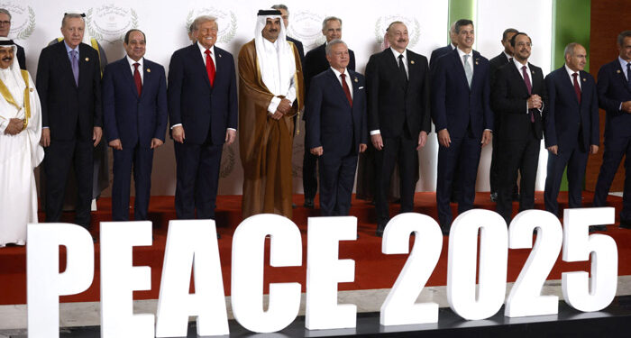 World leaders including U.S. President Donald Trump and Egypt's President Abdel Fattah al-Sisi pose for a family photo, at a world leaders' summit on ending the Gaza war, amid a U.S.-brokered prisoner-hostage swap and ceasefire deal between Israel and Hamas, in Sharm el-Sheikh, Egypt, October 13, 2025. Yoan Valat/Pool via REUTERS