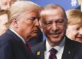 (FILES) In this file photo taken on December 4, 2019, US President Donald Trump (L) and Turkey's President Recep Tayyip Erdogan (R) leave the stage after the family photo to head to the plenary session at the NATO summit at the Grove hotel in Watford, northeast of London. - President Donald Trump has shattered through norms and niceties on the world stage in his nearly three years in office. Entering an election year, Trump is unlikely to slow down as he seeks what has largely eluded him -- a headline-grabbing victory. The tycoon turned president closes 2019 with a new stride after what was perhaps his most unambiguous achievement -- US commandos' raid that killed the leader of the Islamic State extremist group. But the year was also full of tosses and turns for Trump. On his ambition to end the war in Afghanistan, he startled Washington by inviting the Taliban to talks but then declared the talks dead before resuming them. (Photo by PETER NICHOLLS / POOL / AFP) (Photo by PETER NICHOLLS/POOL/AFP via Getty Images)